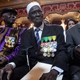 Yoro Diao, (C), 88, waits with other veterans during President Francois Hollande's speech (not pictured) as part of a ceremony to award French citizenship to former Senegalese riflemen veterans at the Elysee Palace in Paris, France, 15 April 2017.